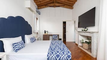 Superior Quadruple Room, City View | Premium bedding, down comforters, minibar, in-room safe