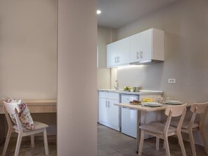 Deluxe-Apartment, Balkon, Gartenblick | Eigene Küche
