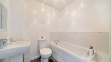 Shower, deep-soaking bathtub, hair dryer, towels