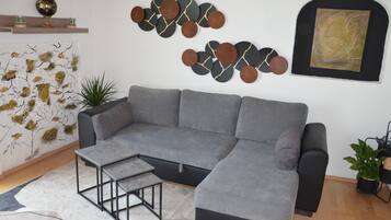 Smart TV, fireplace, foosball, books