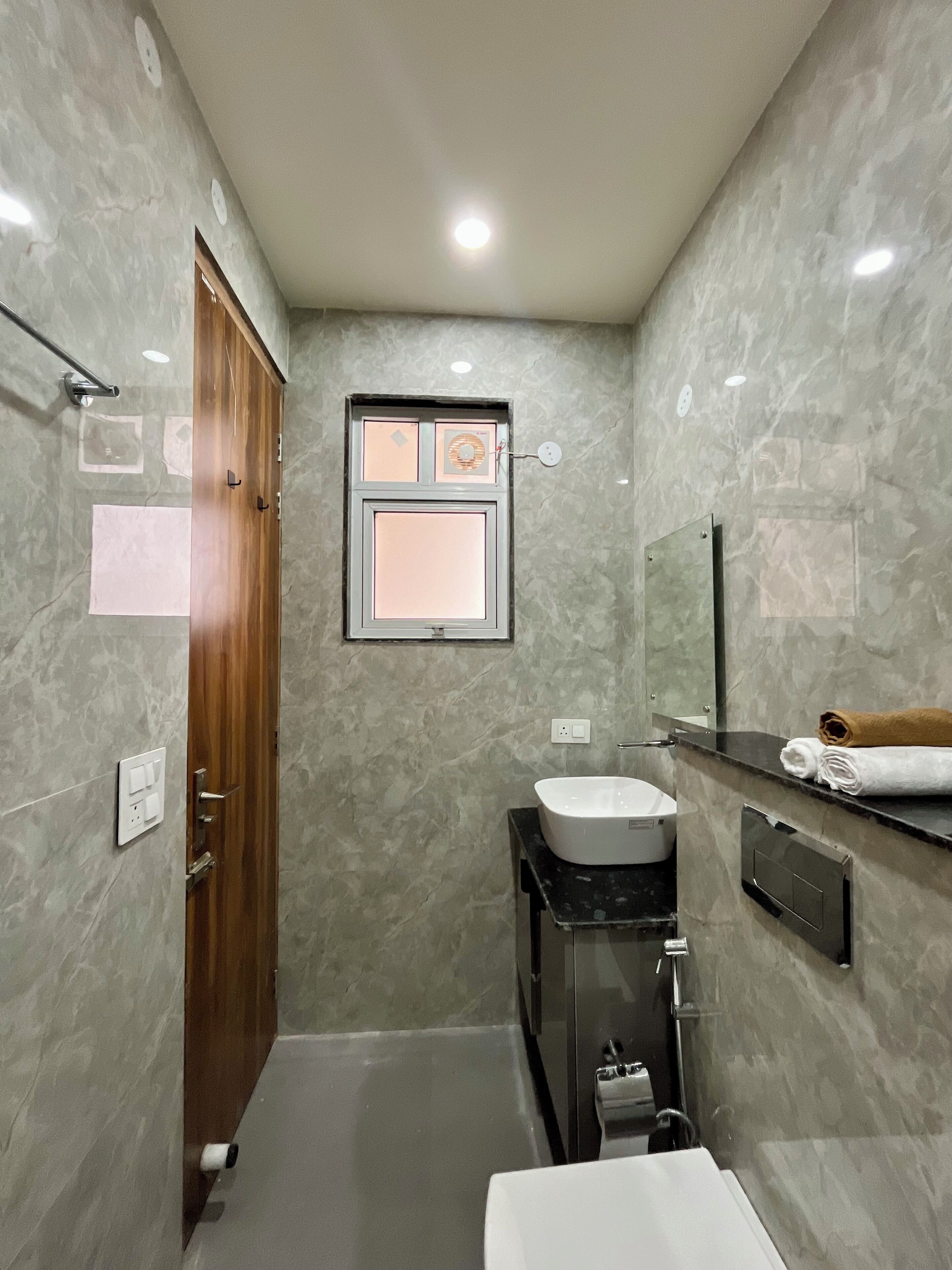 Shower, towels, soap, toilet paper
