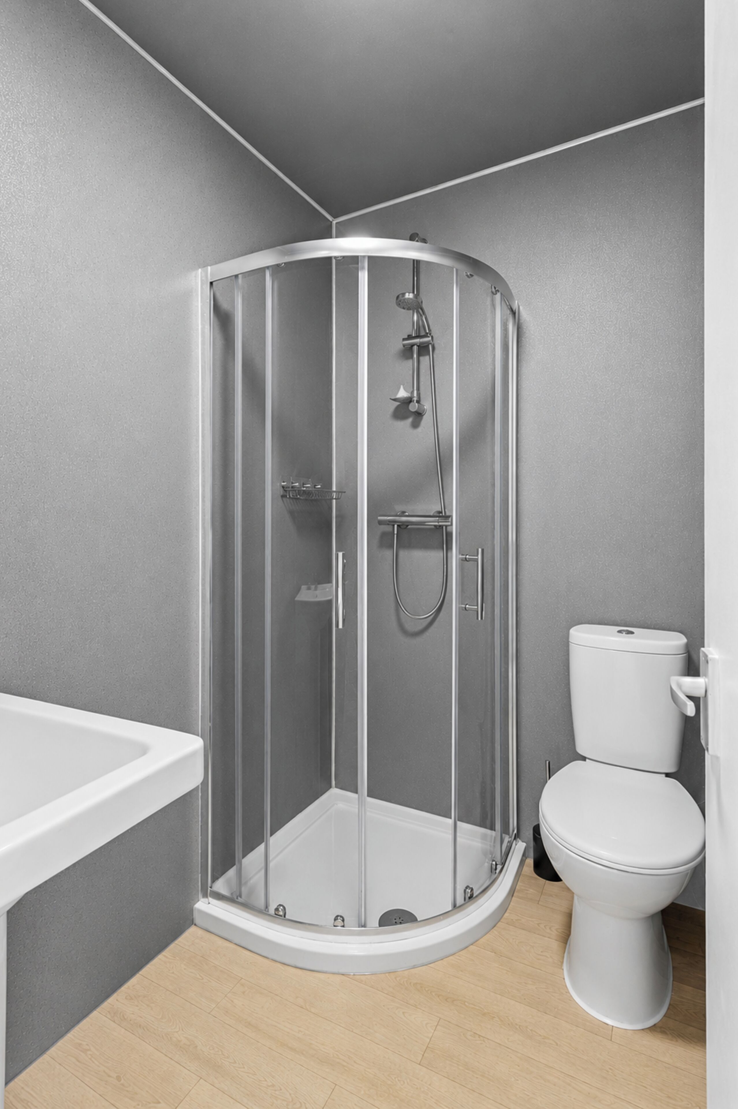 Shower, towels, soap, toilet paper