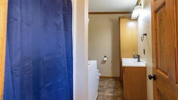 Shower, towels, toilet paper