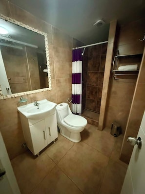 Shower, free toiletries, towels, soap