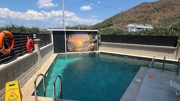 Seasonal outdoor pool, pool umbrellas, sun loungers