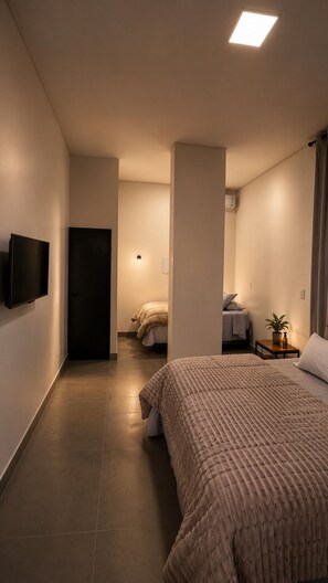 Suite estudio | Ropa de cama de alta calidad y artículos del minibar gratis 