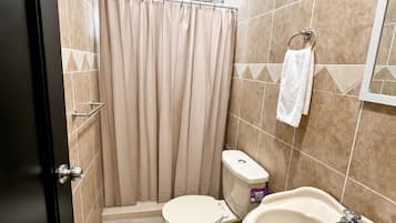 Shower, towels, soap, toilet paper