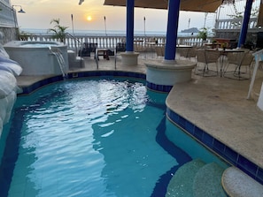 Outdoor pool, open 8:30 AM to 10:30 PM, pool loungers