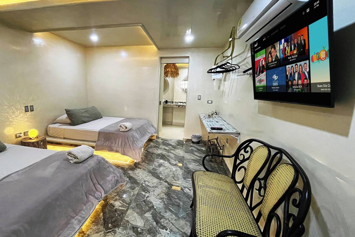 Habitación básica doble, vista al patio | Wifi gratis y ropa de cama