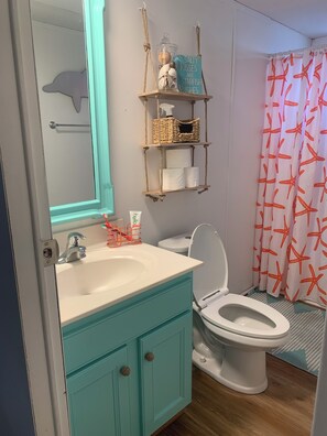 Hair dryer, towels, soap, toilet paper