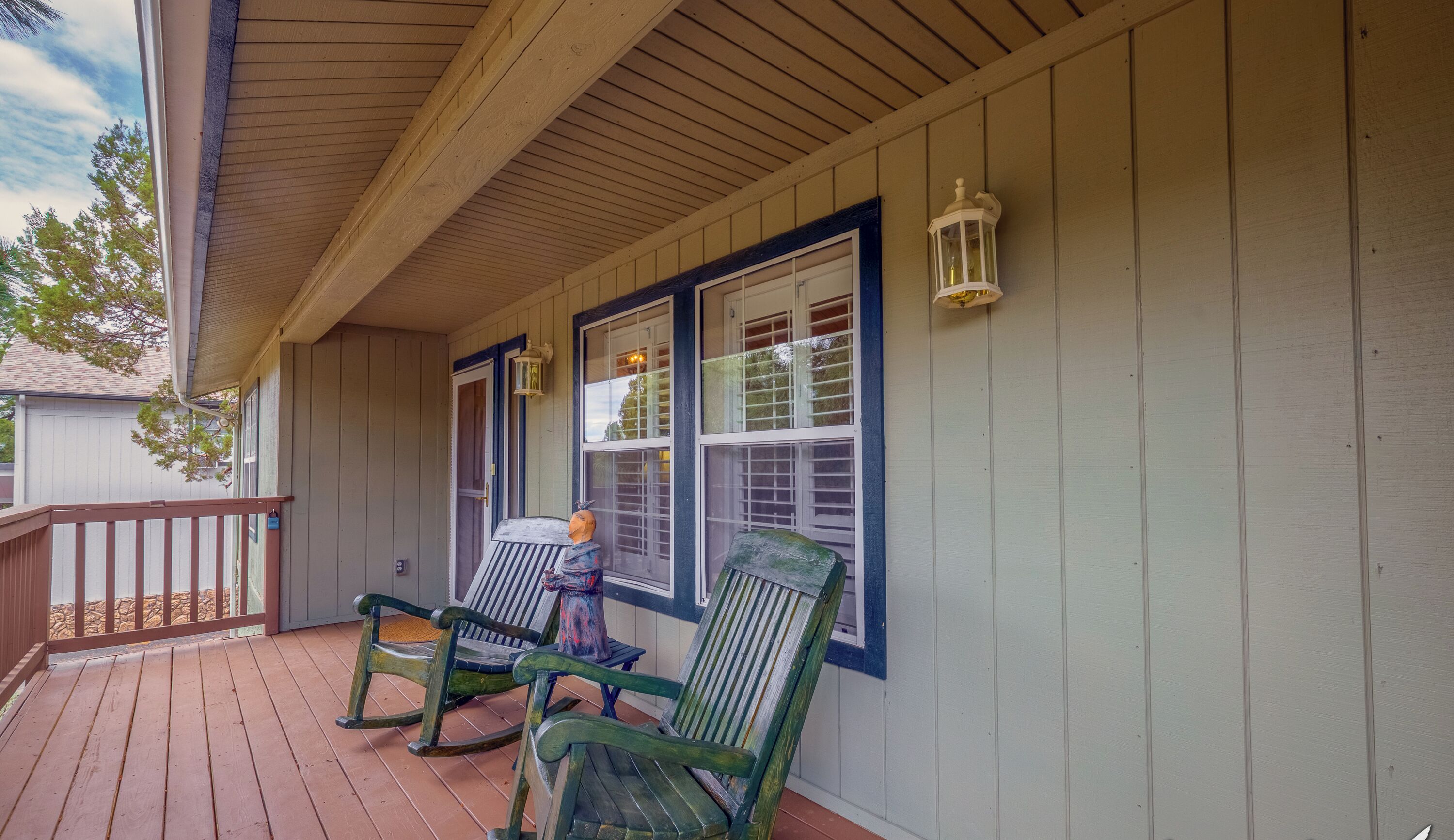 Covered front deck with seating