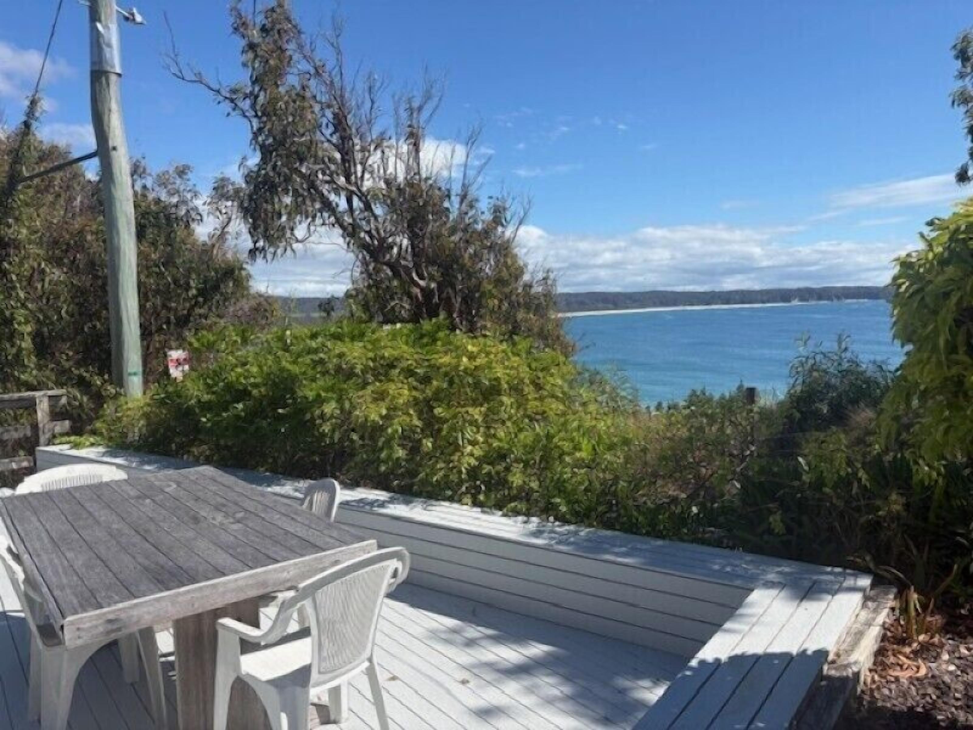 Soak up sweeping beach views from your private deck