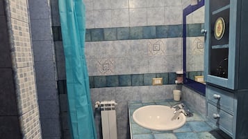 Hair dryer, towels, soap, shampoo