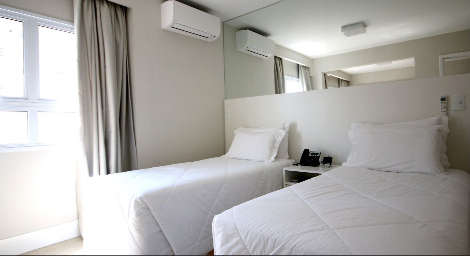 Wi-Fi de cortesia, roupa de cama