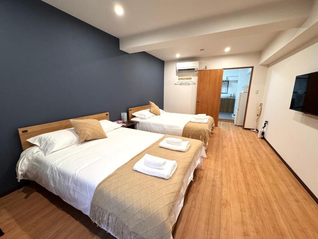 Standard Apartment | Desk, blackout curtains, soundproofing, iron/ironing board