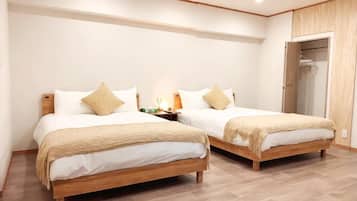 Economy Quadruple Room | Desk, blackout drapes, soundproofing, iron/ironing board