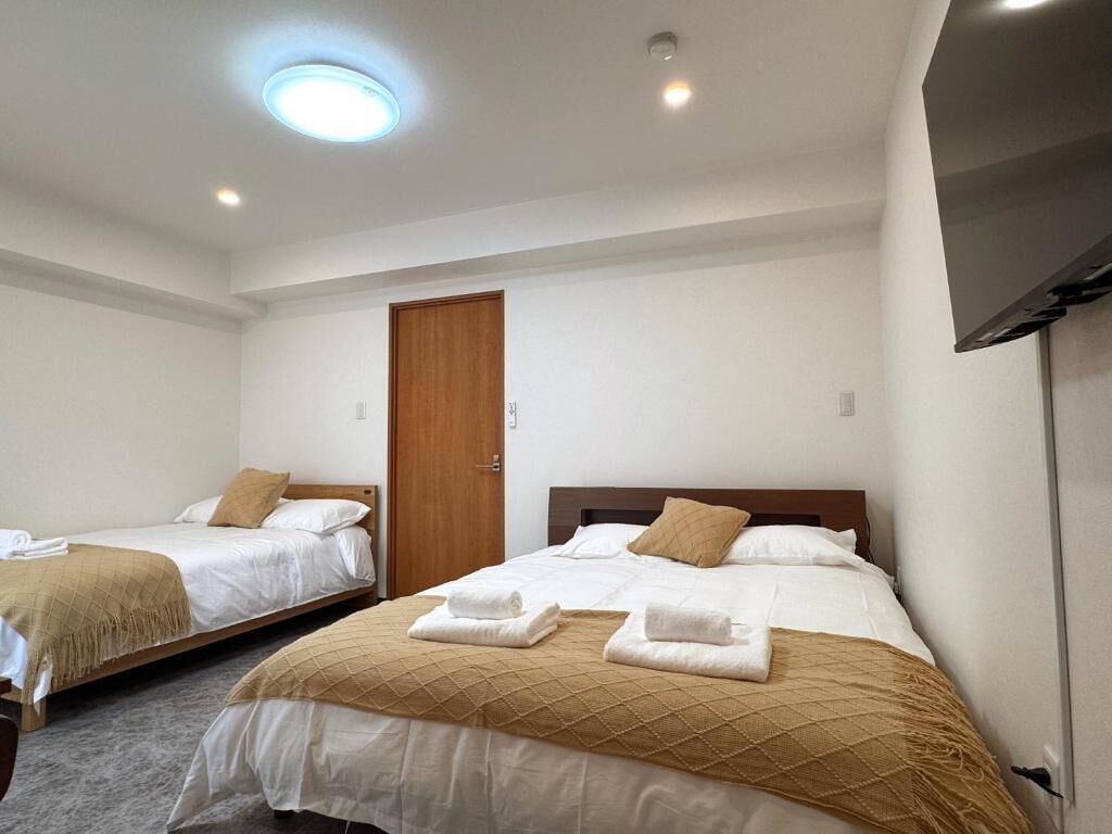 Apartment, Balcony, City View | Desk, blackout curtains, soundproofing, iron/ironing board