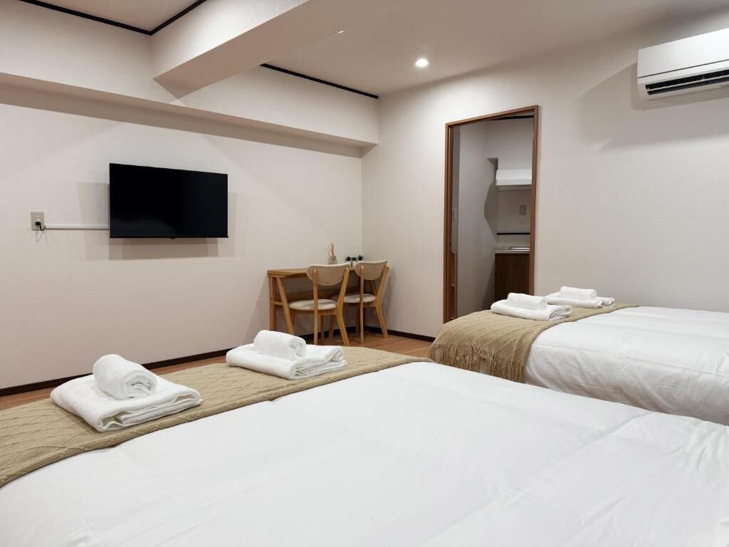 Apartment, 2 Double Beds, Non Smoking | Desk, blackout curtains, soundproofing, iron/ironing board