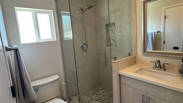 Shower, hair dryer, towels, soap