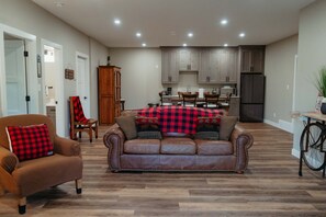 Living area - A relaxing lake view at Eagle Bay Manor suite and hot tub (Eagle Bay)