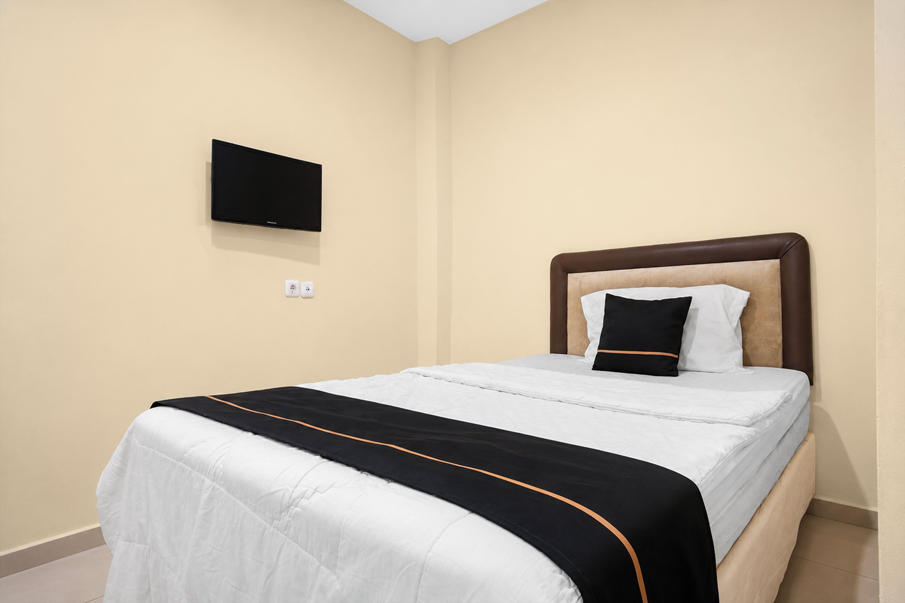 Kamar Single Standar | Meja kerja, Wi-Fi gratis, dan seprai linen