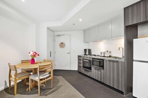 Fridge, microwave, oven, stovetop - Stylish 2-Bed Apartment by 888 Collins (South Melbourne)