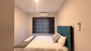 2 dormitorios, tabla de planchar con plancha, wifi y ropa de cama