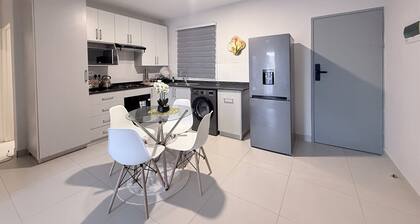 2-bedroom and 2 bathroom apartment in soothing Gaborone with air conditioning