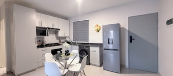 2-bedroom and 2 bathroom apartment in soothing Gaborone with air conditioning