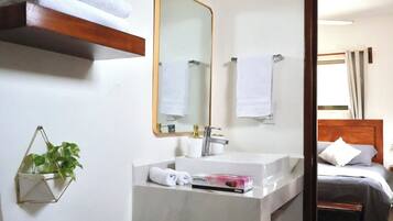 Comfort Room, 1 King Bed, Private Bathroom | Bathroom | Shower, towels, soap, shampoo
