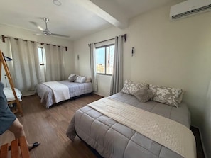 Family Room, 2 Queen Beds, Private Bathroom | Free WiFi