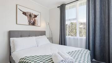 Desk, iron/ironing board, travel crib, WiFi