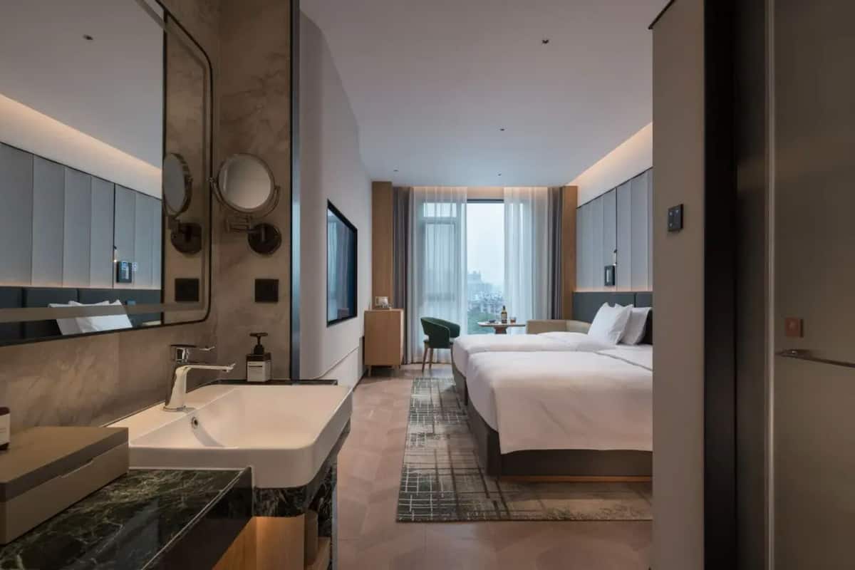 Luxury Twin Room, 2 Double Beds, Non Smoking, City View | Down comforters, desk, laptop workspace, blackout drapes