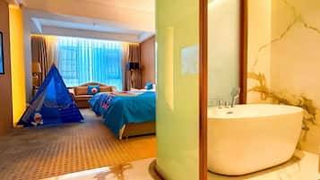 Family Twin Room, City View | Minibar, in-room safe, desk, laptop workspace