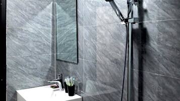 Shower, free toiletries, hair dryer, slippers