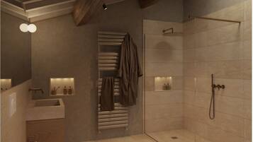 Family Suite, Garden View | Bathroom | Hair dryer, slippers, towels, soap