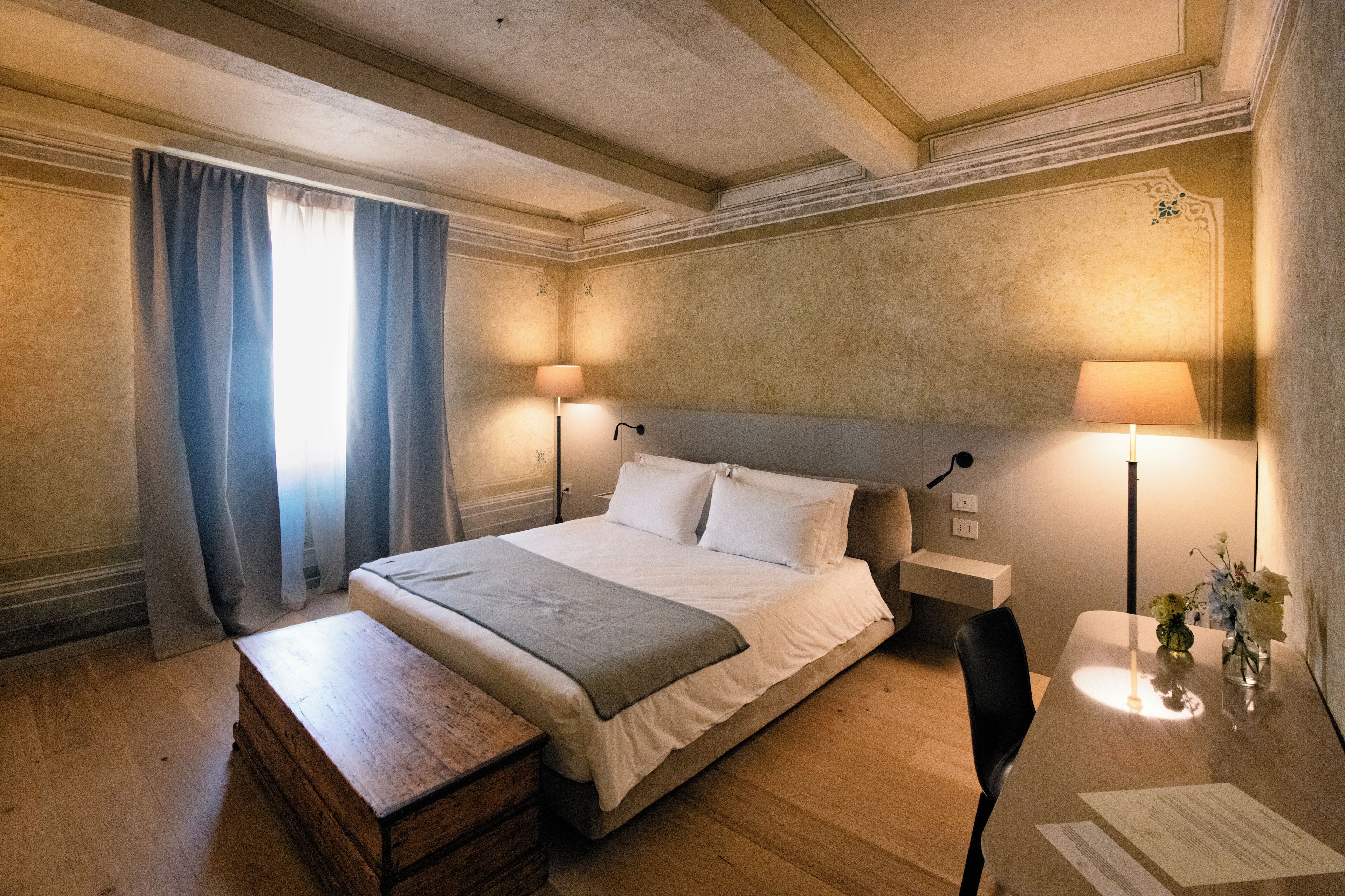 Deluxe Suite, Balcony, Garden View | In-room safe, desk, soundproofing, iron/ironing board