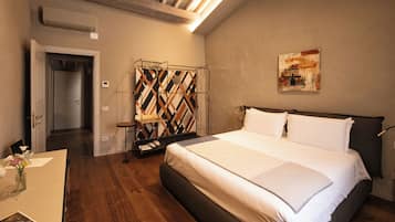 Family Suite, Garden View | In-room safe, desk, soundproofing, iron/ironing board