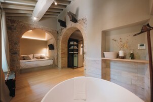 Junior Suite, Garden View | In-room safe, desk, soundproofing, iron/ironing board