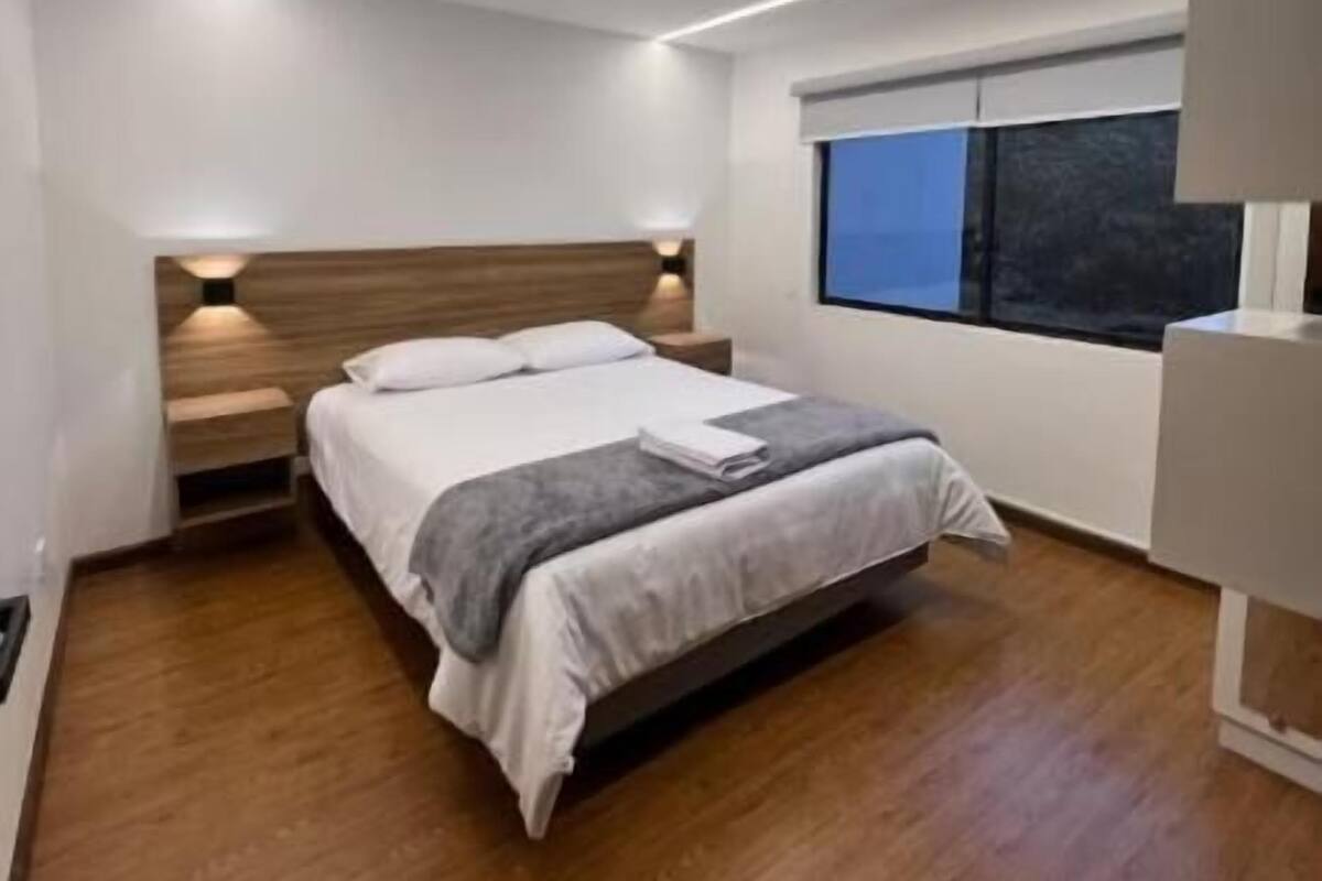 Deluxe Apartment, City View | Hypo-allergenic bedding available, WiFi (free), bed sheets