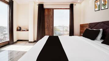 Individually furnished, desk, laptop workspace, blackout curtains