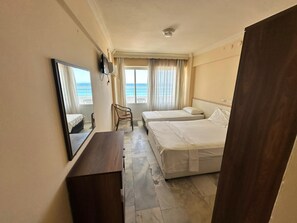 Kamar Triple Standar, balkon, pemandangan laut | Wi-Fi gratis