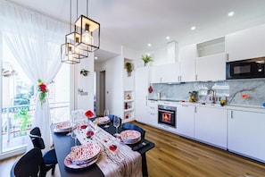 Departamento Premium, balcón, vista a la ciudad | Restaurantes