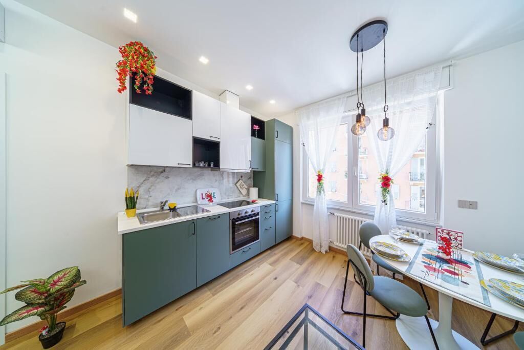 Departamento superior, balcón, vista a la ciudad | Cocina privada