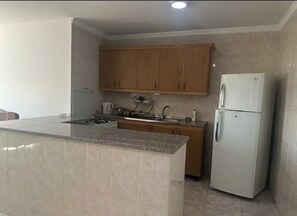Private kitchen -     Bright & Comfortable 2-Bedroom Apartment – Jabal Amman (Amman)