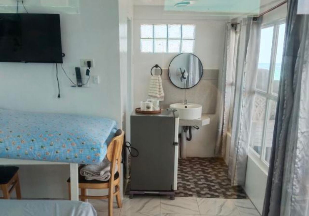 Family Room, Balcony, Ocean View | Free WiFi