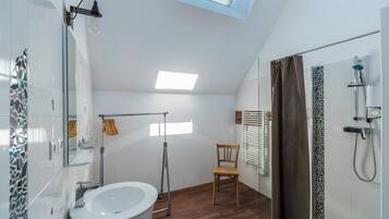 Deluxe Apartment, Patio, Garden View | Bathroom | Slippers