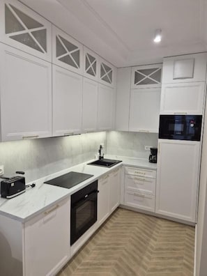 Apartamento Deluxe | Cocina privada