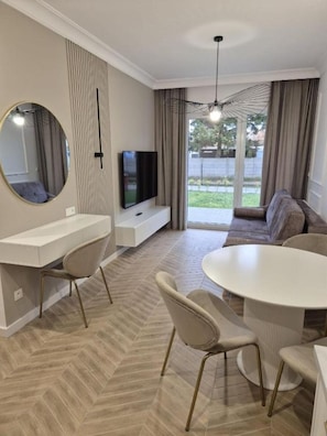 Apartamento Deluxe | Zona de estar