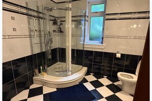 Shower, deep-soaking bathtub, hair dryer, towels